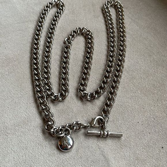 CALVIN KLEIN “CK” chain belt